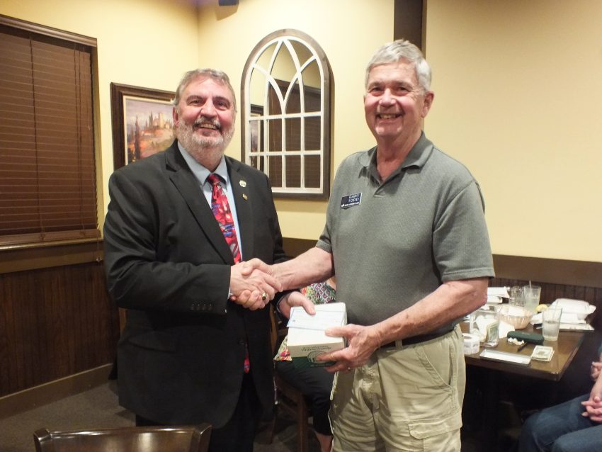 Charles Wethington being presented with check by New Bern Civitan Club President Gary Todd