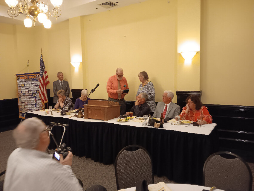 Jim Comer presenting award to Eileen Buscemi