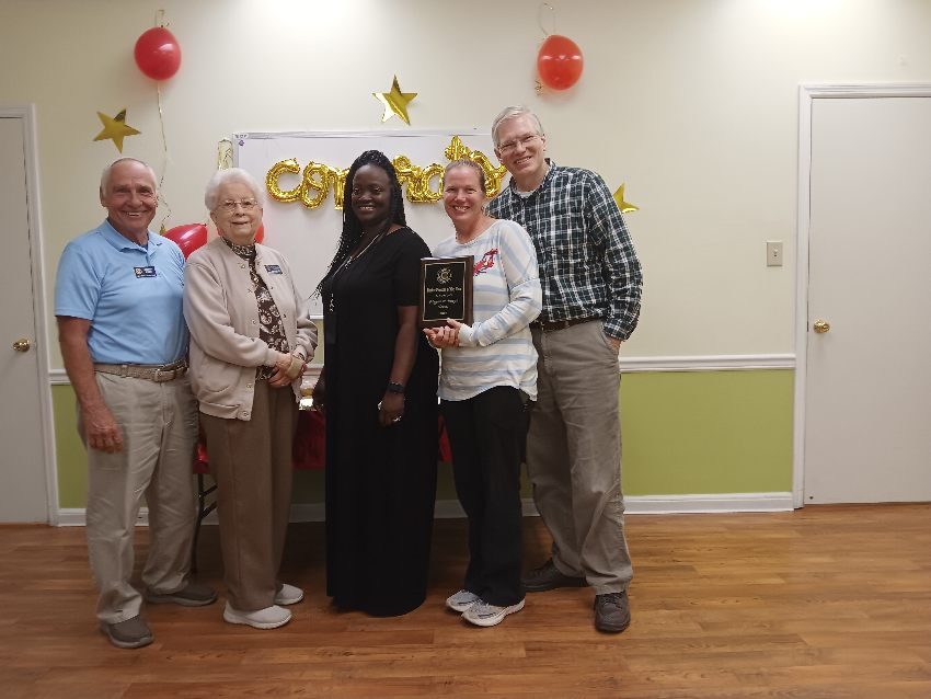 NBCC President Dennis Pymm, Community Awards Chair Helen Shine, Social Worker Veronica Edwards, Foster Parents Megan Davis and Joe Davis.