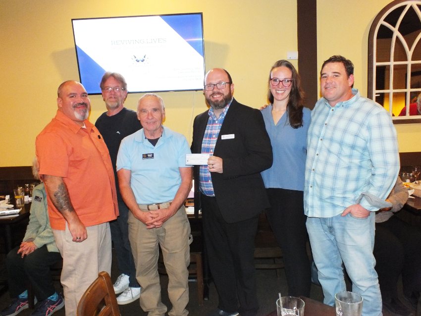 Pictured (l. to r.) Bernie Lopez - RLM Board Member, Howard - former resident, President Dennis Pymm, Mark Devanny - Director, Laura Oxyer - Coordinator, Scottie - resident