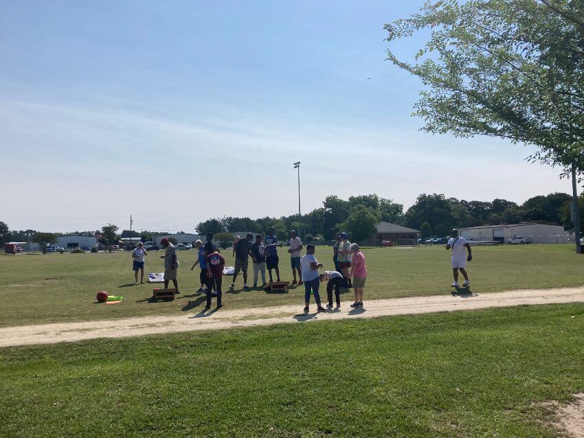 People playing ball on ball field