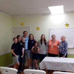 Rebecca and Freddier Mercer, stand with their five children